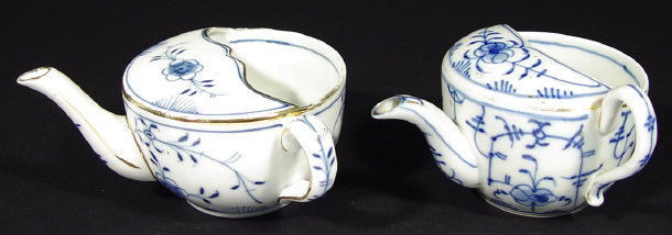 Appraisal: Two china nursing cups printed with blue flowers impressed and