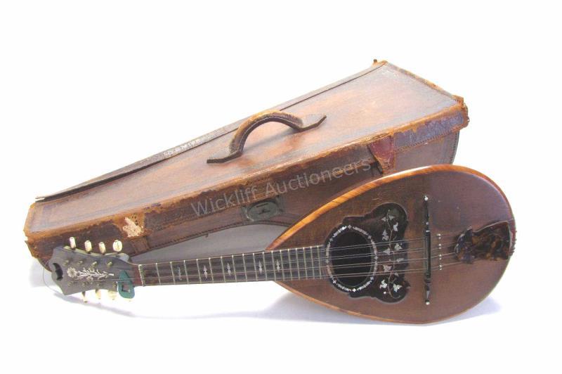 Appraisal: Umberto Ceccherini Italian Mandolin tortoise shell pickguard and tailpiece mother