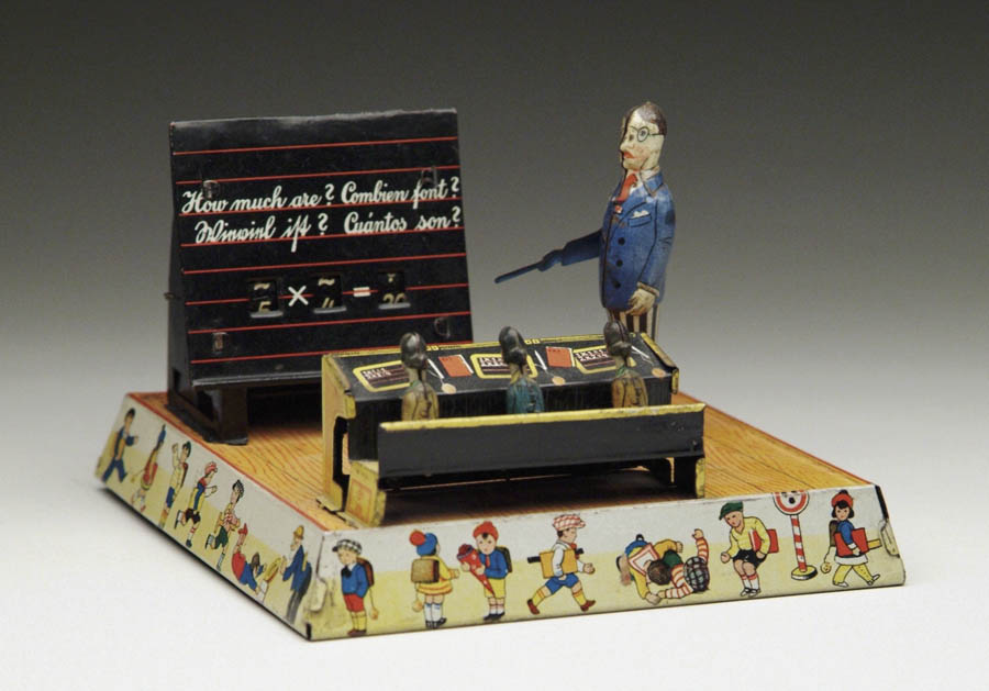 Appraisal: SCHOOLMASTER WINDUP TOY By CKO George Kellerman Lithographed figure standing