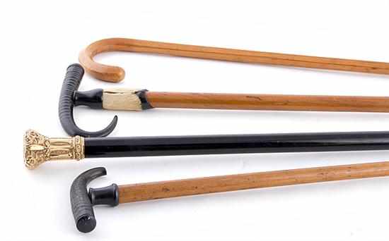 Appraisal: Collection of gentlemen's walking sticks late th century ebony presentation