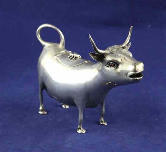 Appraisal: A th century German standard silver cow creamer with ruby