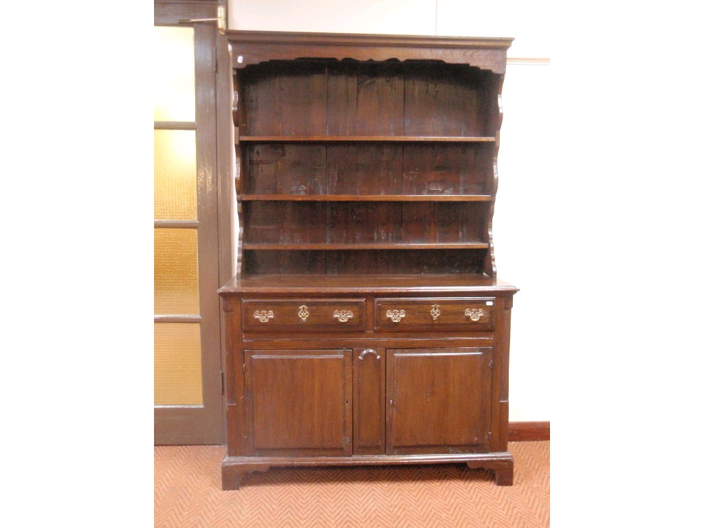 Appraisal: A small oak dresser in the Georgian manner with pine