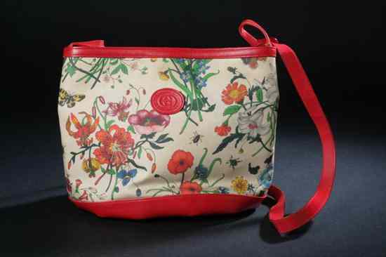 Appraisal: VINTAGE GUCCI FLORAL CANVAS AND RED LEATHER HANDBAG s With