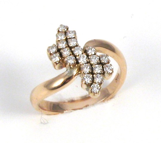 Appraisal: DIAMOND AND FOURTEEN KARAT GOLD RING set with round-cut diamonds