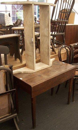 Appraisal: An oak Pembroke table with drawer to one end the