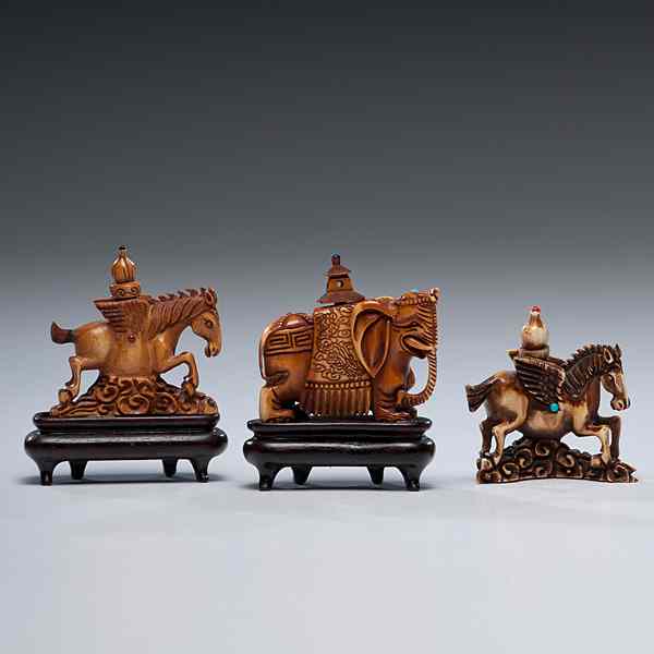 Appraisal: Chinese Carved Ivory Snuff Bottles Chinese Three carved ivory snuff