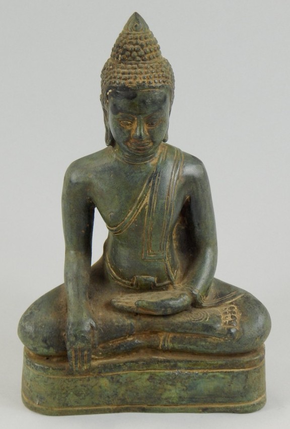 Appraisal: A hollow cast bronze seated Buddhistic figure with green patination