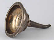 Appraisal: A Georgian silver wine funnel with ribbed rim complete with