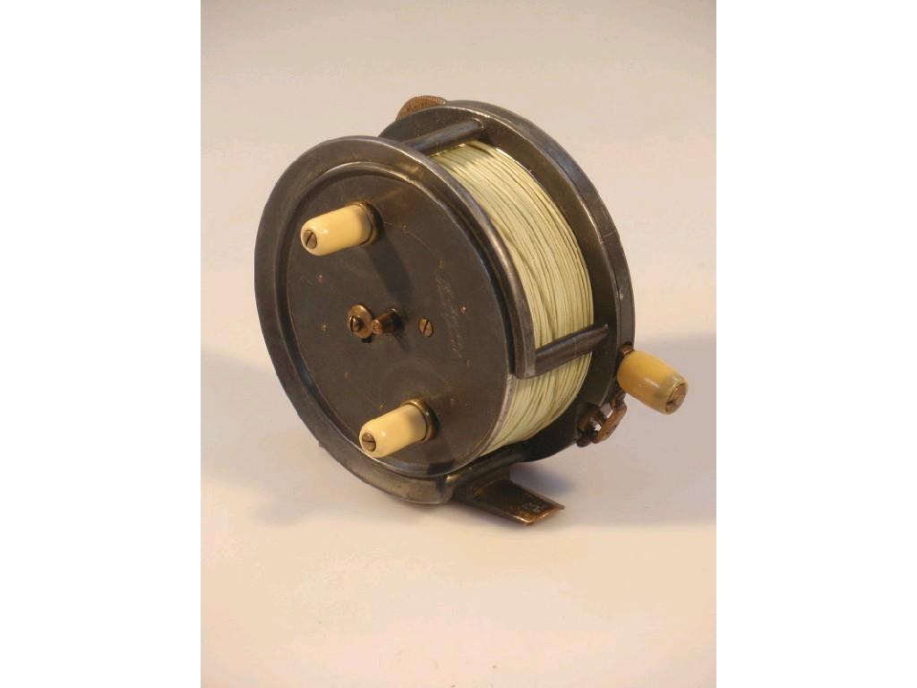 Appraisal: An antique alloy fly fishing reel signed H Moore Liverpool