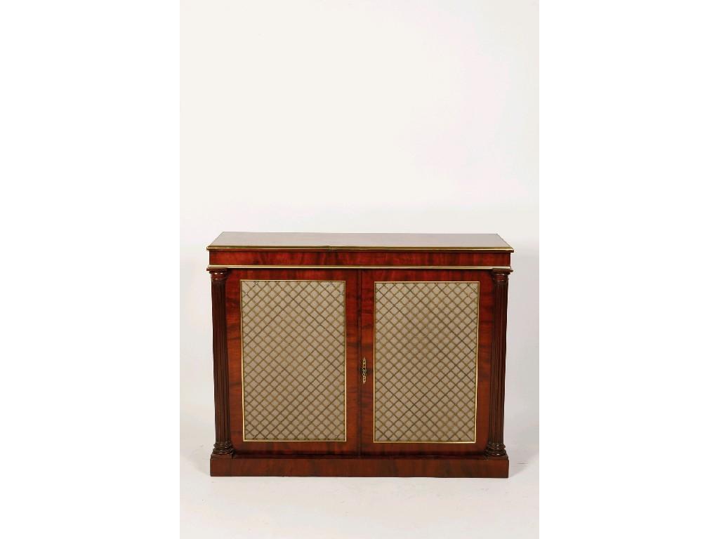 Appraisal: A REGENCY MAHOGANY AND BRASS MOUNTED SIDE CABINET the rectangular