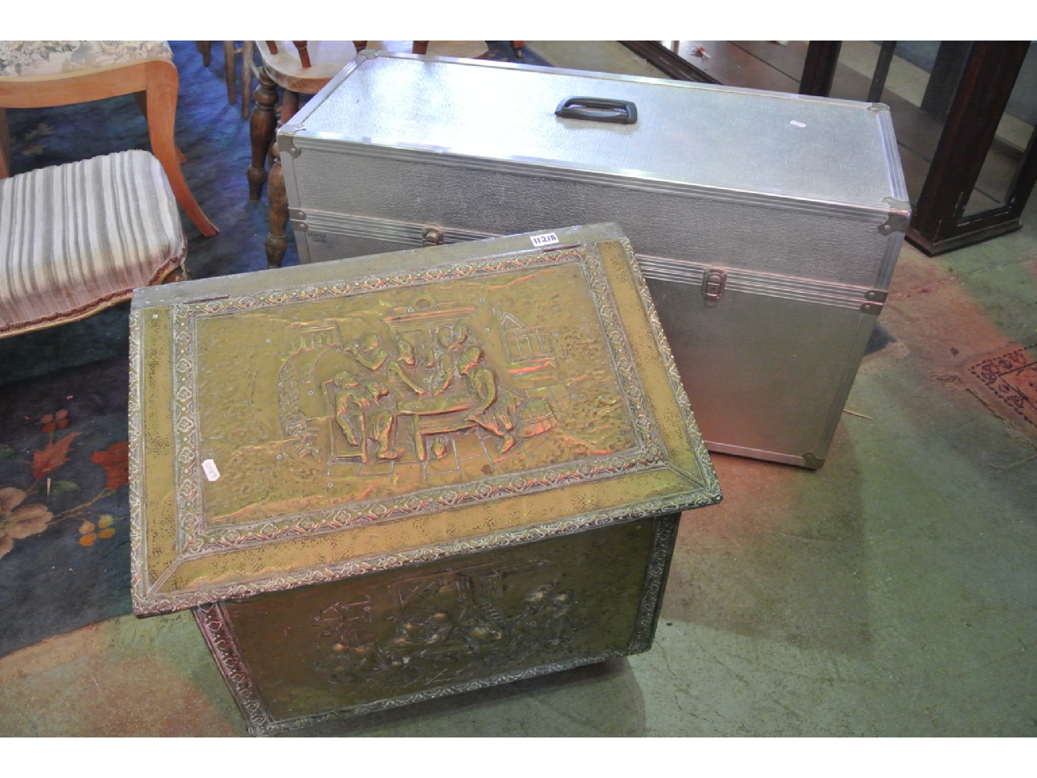 Appraisal: An embossed brass coal box and a large photographic travel