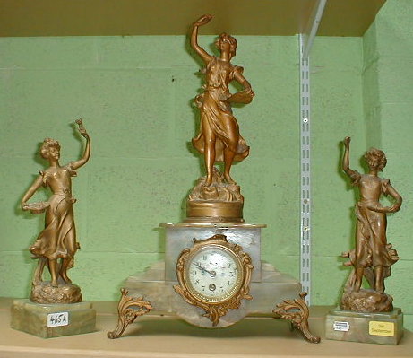 Appraisal: A French green onyx clock garniture with gilt spelter figures