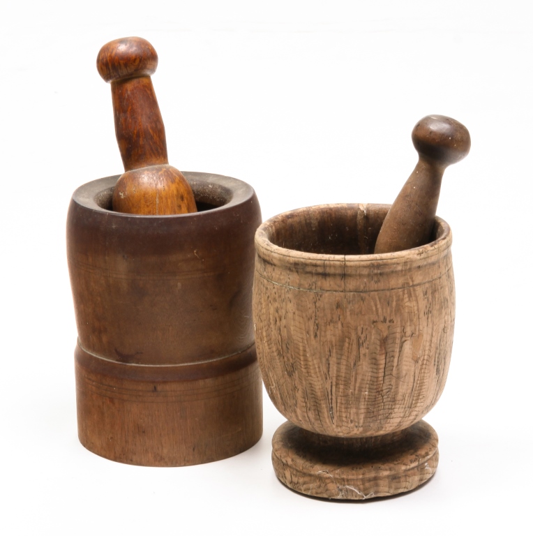 Appraisal: TWO AMERICAN MORTARS AND PESTLES Nineteenth century Turned walnut h