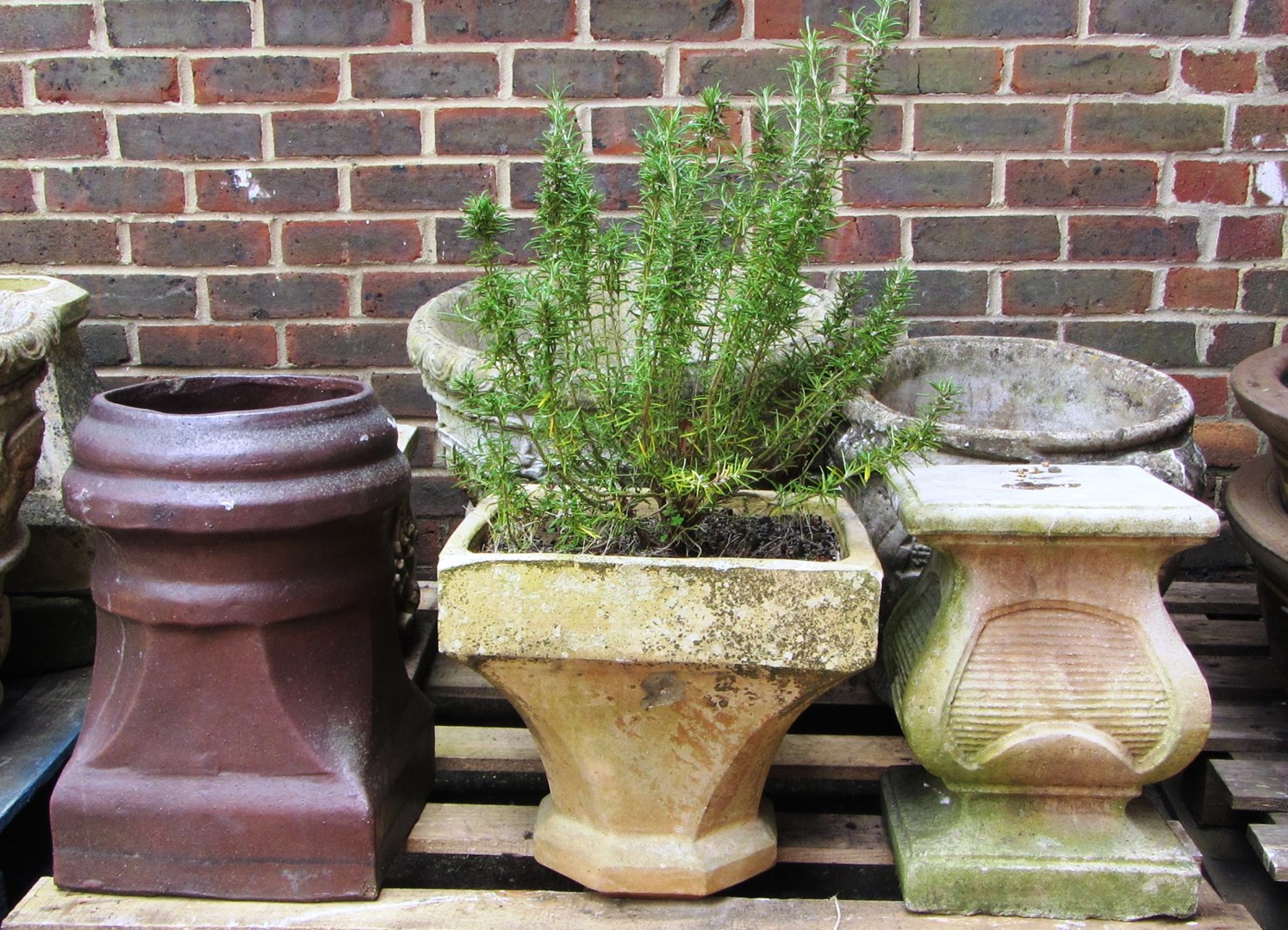 Appraisal: Three pallets of various reconstituted stone jardinieres and chimney pots