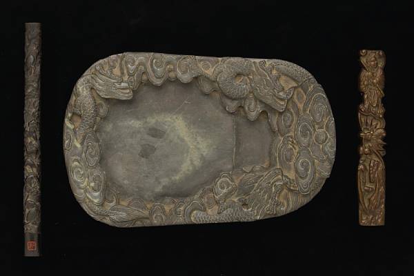 Appraisal: An assembled inkstone set Including carved dragon-decorated inkstone chips a