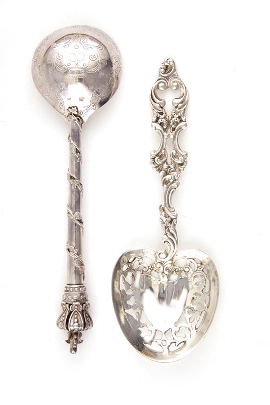 Appraisal: Sterling serving spoons one pierced L and other with crown