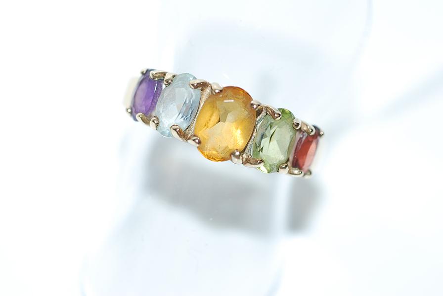 Appraisal: A GARNET PERIDOT CITRINE AMETHYST AND TOPAZ RING IN CT