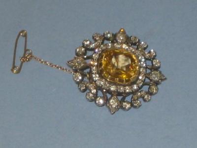 Appraisal: AN EARLY VICTORIAN DIAMOND AND YELLOW STONE BROOCH probably yellow