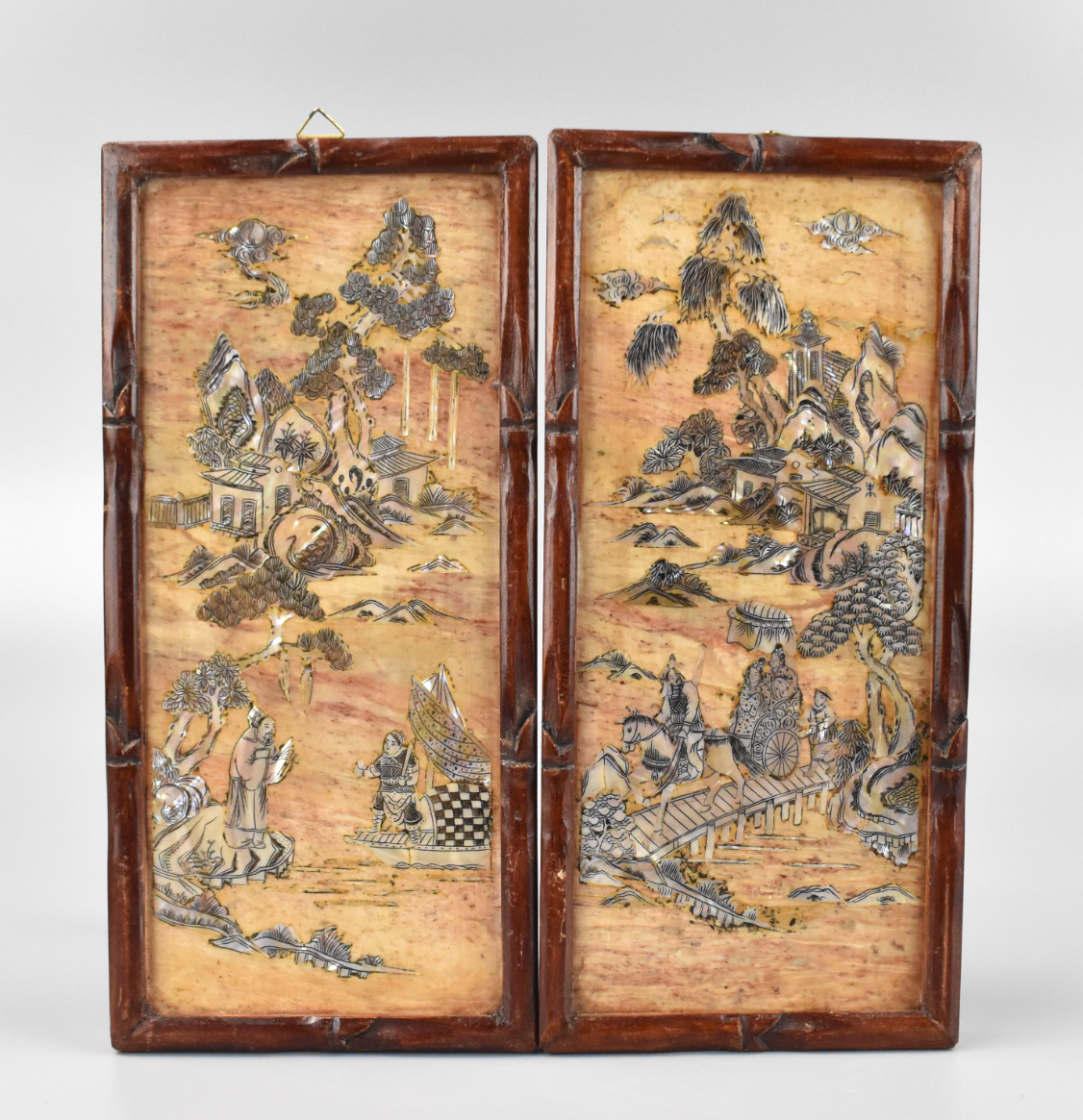 Appraisal: A pair of framed Chinese panels with inlaid mother-of-pearl of