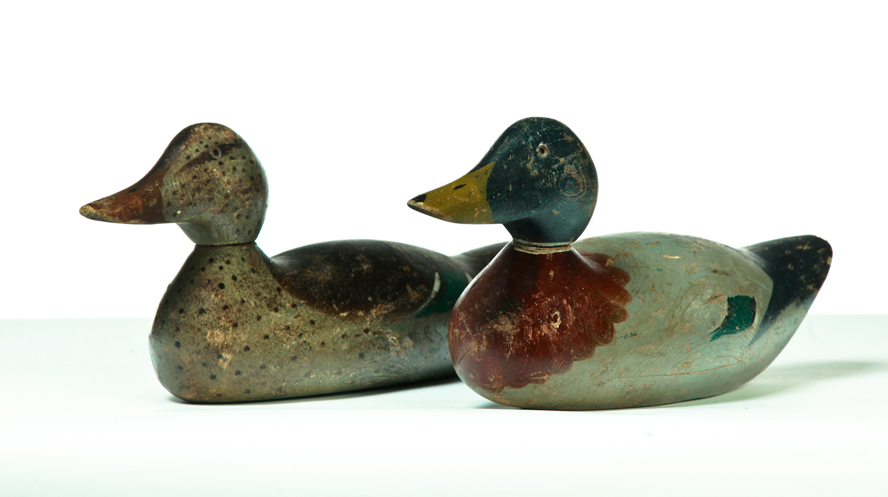 Appraisal: PAIR OF AMERICAN DUCK DECOYS Hayes Decoy Company Jefferson Missouri