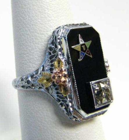 Appraisal: Lady's K yellow gold black onyx and diamond Eastern Star