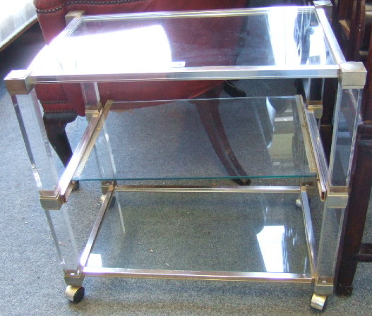 Appraisal: A th century perspex three tier tea trolley cm wide