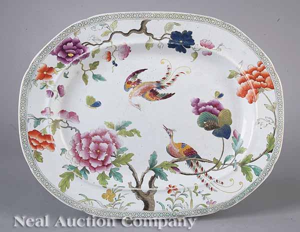 Appraisal: An English Ironstone Platter c polychrome floral and exotic bird