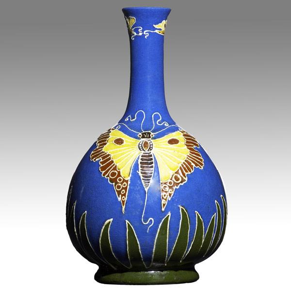 Appraisal: ALBERT CUSICKVase decorated in squeezebag with butterflies possibly Avon or