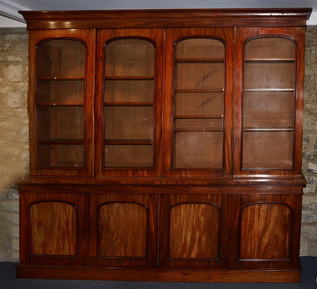 Appraisal: A VICTORIAN MAHOGANY LIBRARY BOOKCASE constructed in three sections the