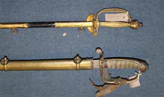 Appraisal: A Victorian officer's sword with inch acid etched blade by