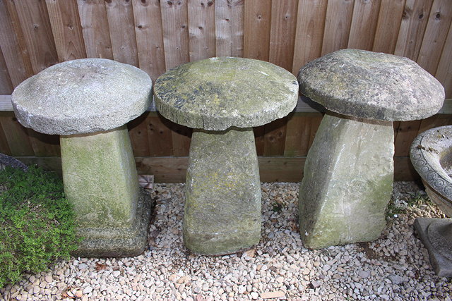 Appraisal: TWO ANTIQUE STONE STADDLE STONES each approximately cm in height