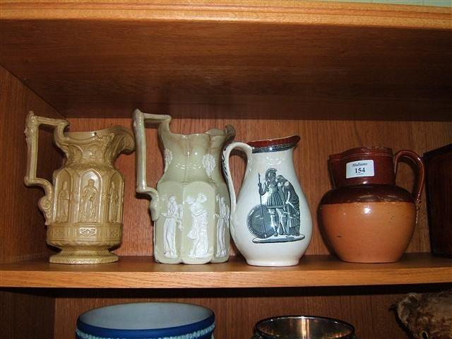 Appraisal: A collection of four various Victorian stoneware jugs