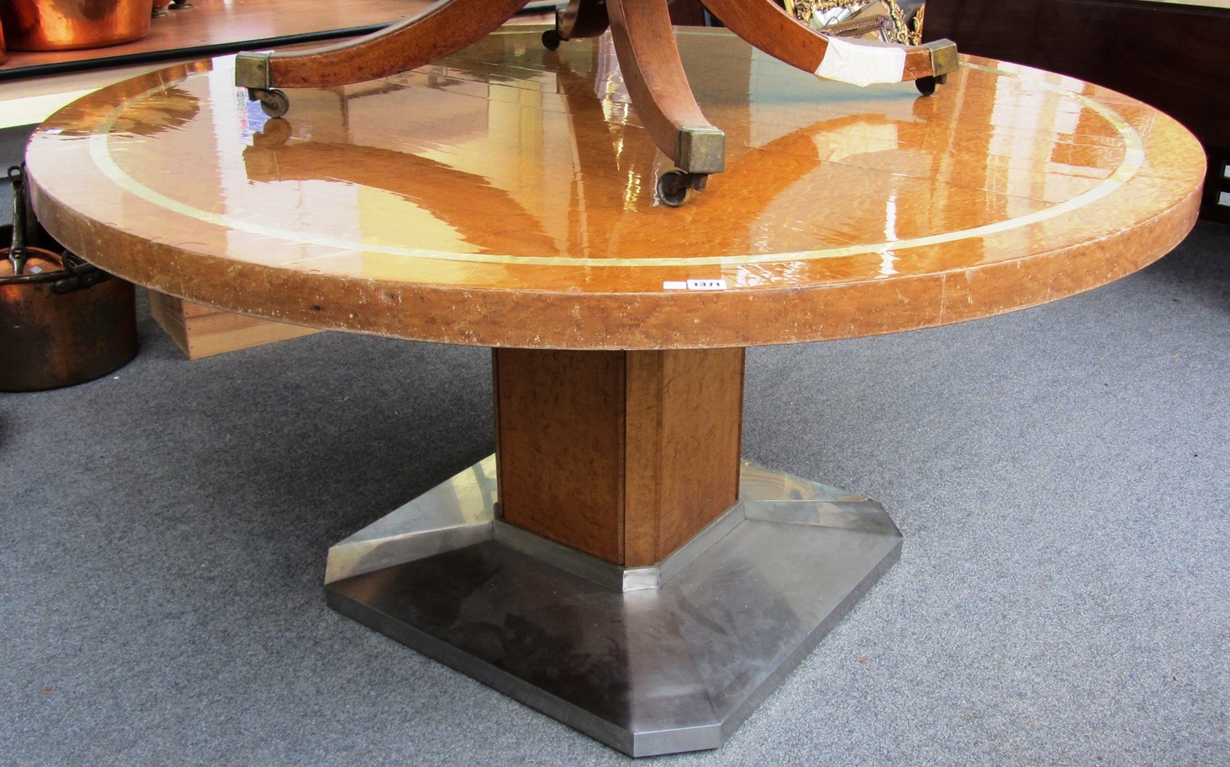 Appraisal: A mid th century circular birds eye maple dining table