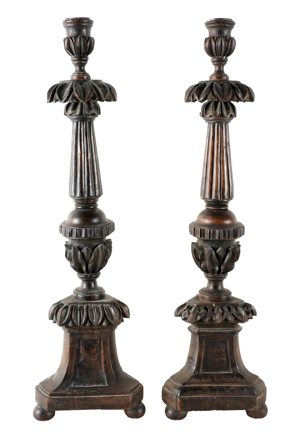 Appraisal: PAIR BAROQUE STYLE CARVED WALNUT CANDLESTICKSCondition with wax to sockets