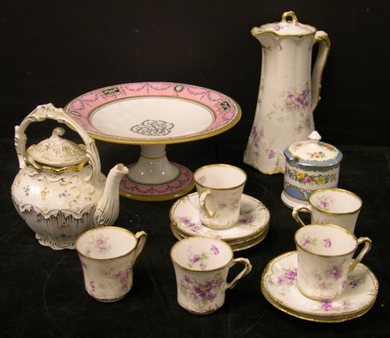 Appraisal: Limoges floral decorated chocolate pot with five cups and saucers