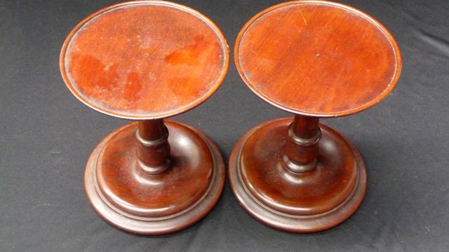 Appraisal: A pair of Georgian style turned wooden pedestals cm high