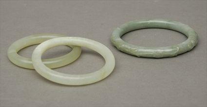 Appraisal: Three Chinese Jade Bangles in to in diam