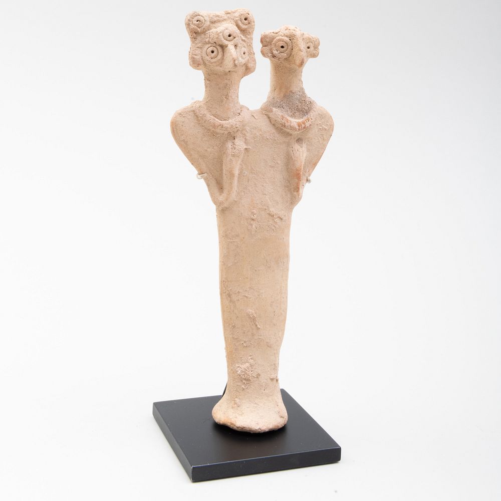 Appraisal: Syro-Hittite Pottery Double-Headed Figure Raised on stand x x in