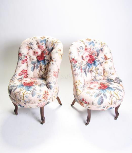 Appraisal: A pair of floral upholstered boudoir chairs button tufted backs