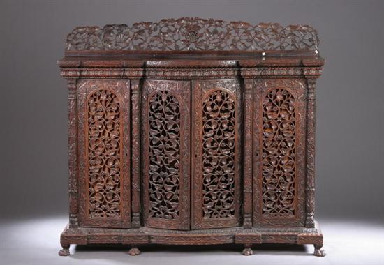 Appraisal: INDIAN WOOD CABINET th century Of rectangular outline with four