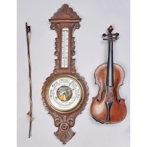 Appraisal: An Edwardian carved oak aneroid barometer with mercury thermometer cm