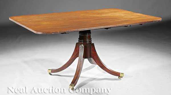 Appraisal: An Antique George III-Style Mahogany Pedestal Dining Table reeded edge