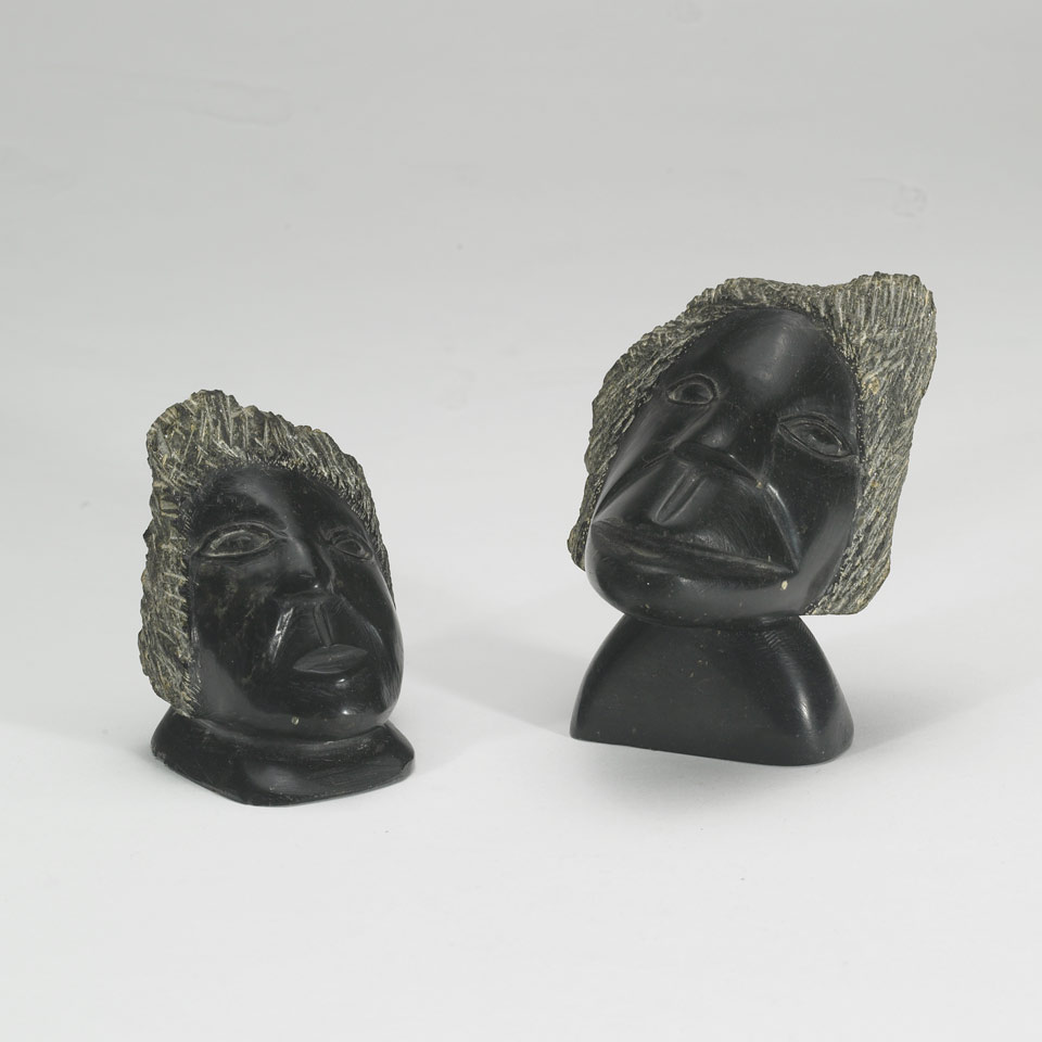 Appraisal: Unidentified Lake Harbour INUIT COUPLE PAIR OF BUSTS stone ca