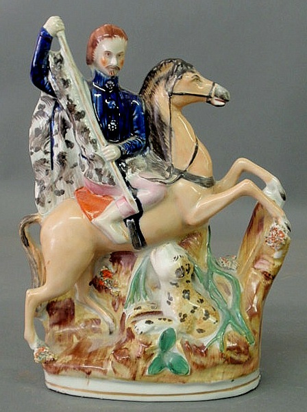 Appraisal: Rare Staffordshire figure of a hunter on horseback with his