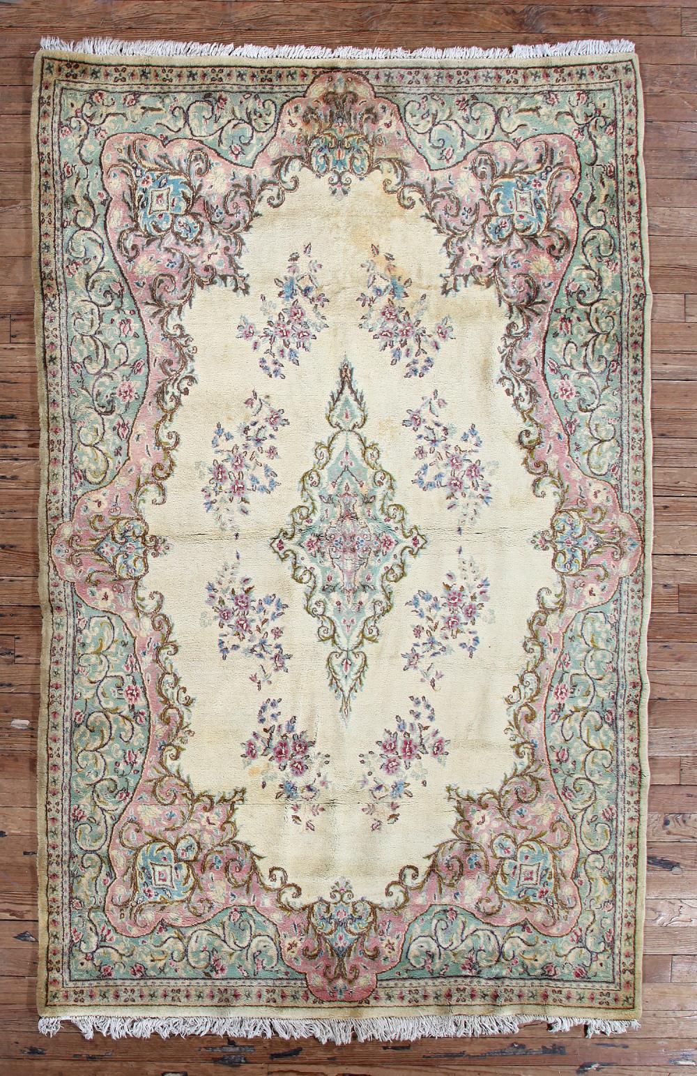 Appraisal: Kirman Carpet c muted green rose and blue scrolling foliate