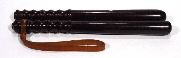 Appraisal: Two turned mahogany truncheons - one for the Eastbourne Borough