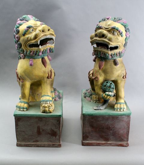 Appraisal: A pair of large th century Chinese Sancai glazed Fu