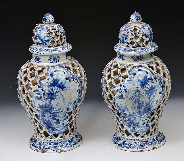 Appraisal: A PAIR OF DUTCH DELFT BLUE AND WHITE POTTERY BALUSTER