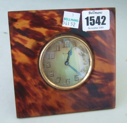 Appraisal: An eight day mantel clock with tortoiseshell case and silver