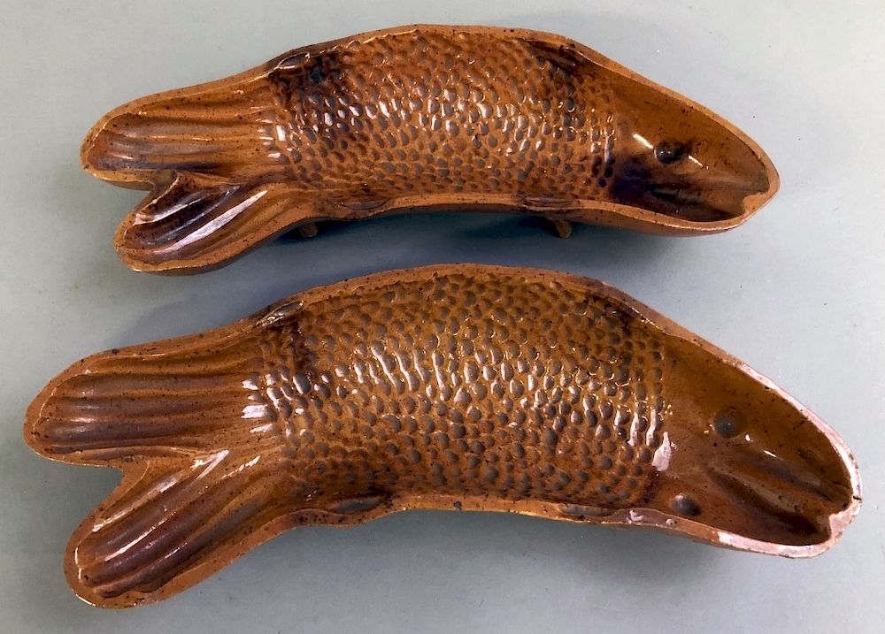 Appraisal: Pair of Redware Fish Molds Unusual pair of redware fish